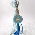 Gouri Turquoise Eye Plexiglass