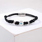 White Eye Black Cord Bracelet