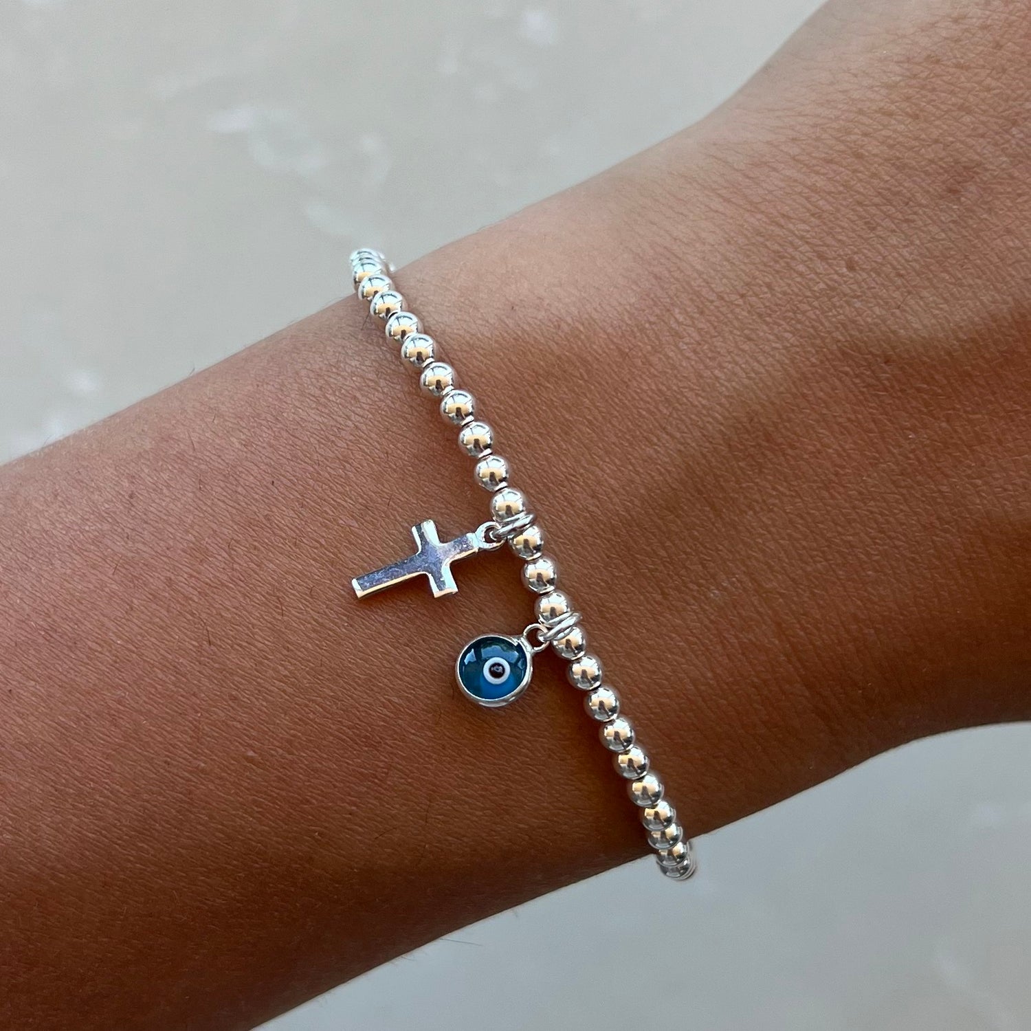 Cross & Evil Eye Light BlueSilver Elastic Bracelets