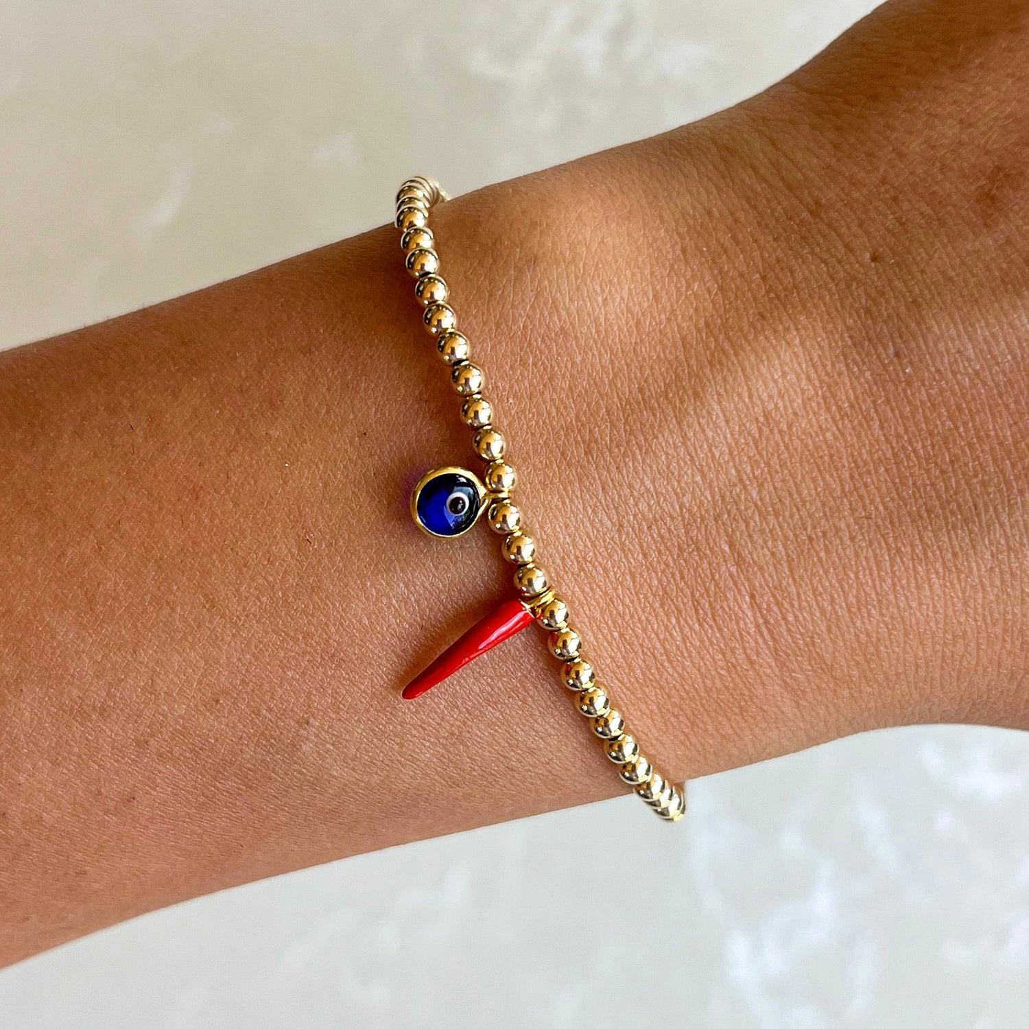 Chilli & Evil Eye Gold Elastic Bracelets